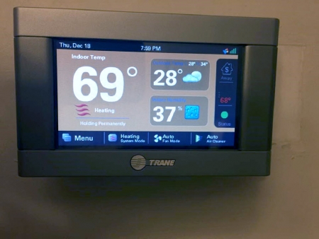 Smart thermostat showing 69 degrees